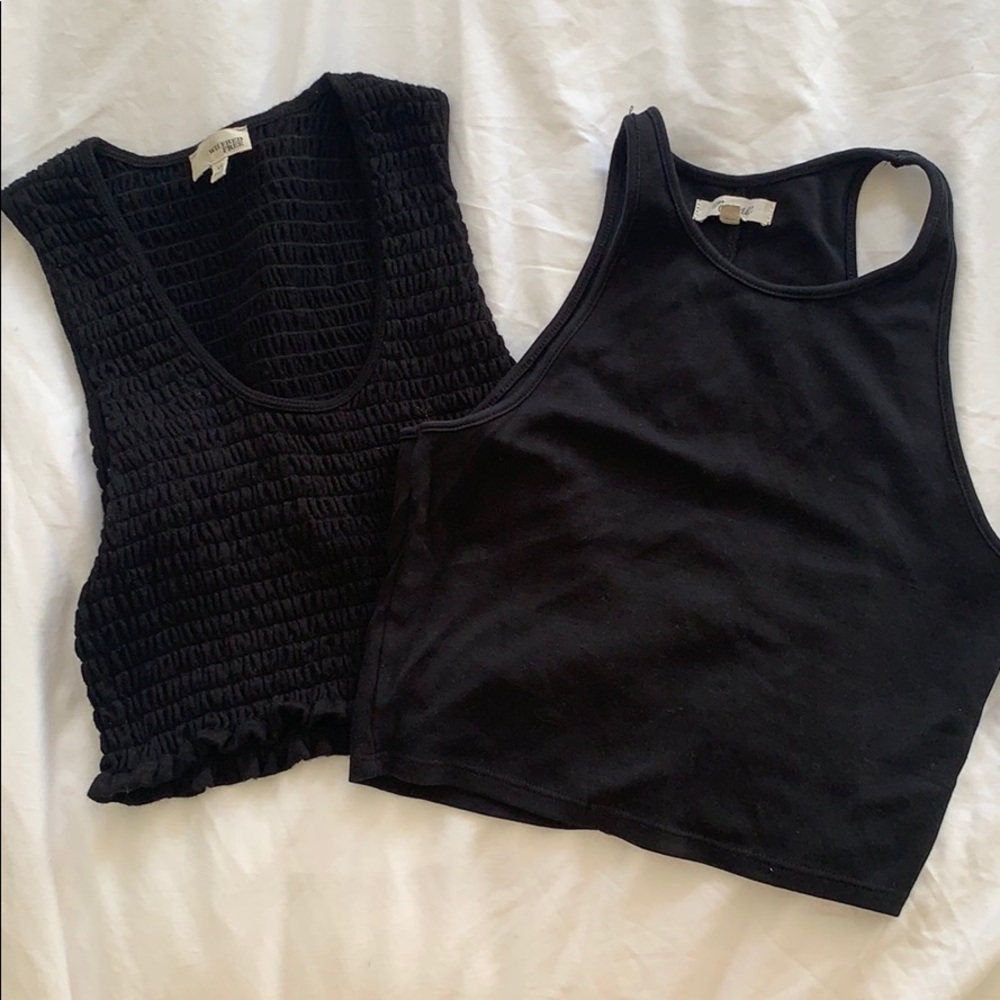 Two black cropped tanks from Aritzia and Madewell
